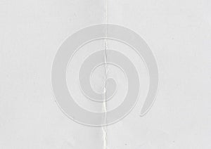 High resolution large image of white paper texture background scan folded in half, soft fine grain uncoated paper for water colors