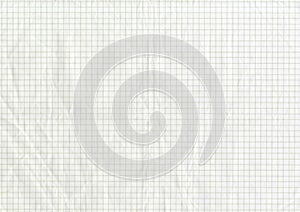 High resolution large image of a white uncoated checkered graph paper scan wrinkled weathered old thin textbook