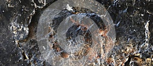 High-resolution natural stone surface with erosion patterns.