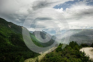 A high-resolution panorama of a beautiful summer view of the mountains. Thunderclouds over the mountains in Dagestan