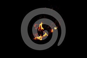 High resolution photo of flame and sparkl on black background. fire flames. Background Texture. Elemen for design abstract of