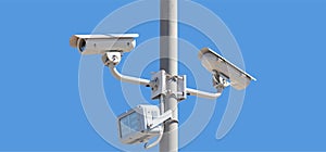 High resolution security cameras, blue sky background, copy space