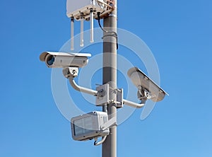 High resolution security cameras, blue sky background, copy space