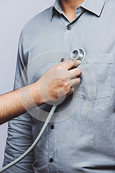 High-Resolution stock photo of a man for a routine check-up to doctor