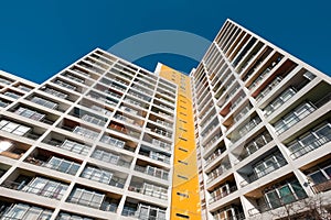 High-rise apartment building facade , real estate low angle view