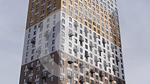 High rise apartment building surrounded by blue sky. Action. Newly build residential multi storey house of grey and