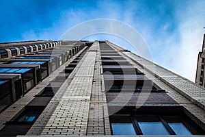 High-rise building rushes into the blue sky