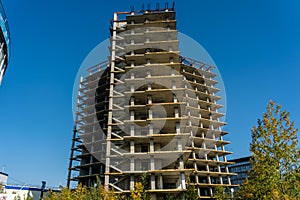 High-rise building under construction. Unfinished residential high-rise building