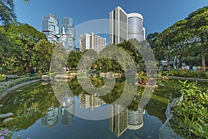 High rise office building and public park in central district of Hong Kong city