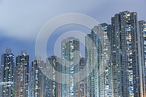 High rise residential building in Hong Kong city at night