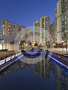 High rise residential building and park in public estate in Hong Kong at night