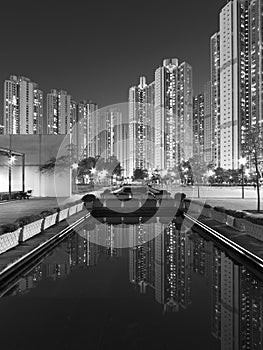 High rise residential building and park in public estate in Hong Kong at night