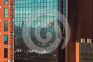 High-rise workers cleaning the windows of a skyscraper