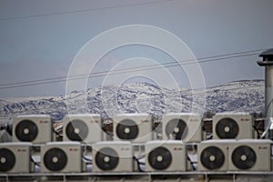 High roof views. chimneys and snow cover. minimalist photo.