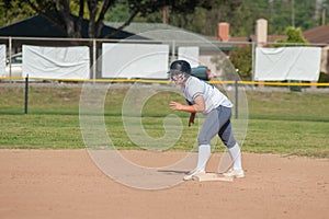 High school athlete taking off on the pitch