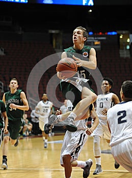 High School Basketball Game Action.