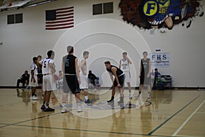 High school basketball teams on basketball court