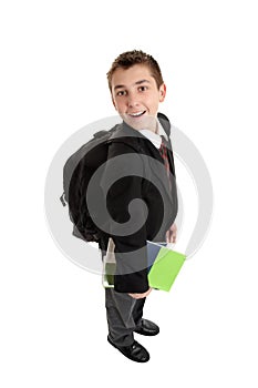 High School boy carrying bag and books