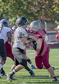 High school football players during offense