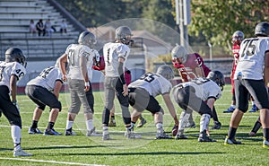 High School football players at snap