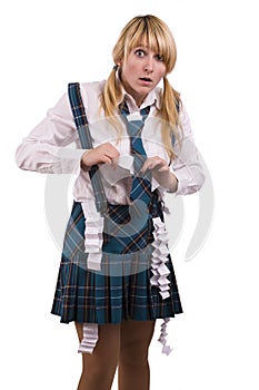 High school girl is hiding crib sheet in uniform.