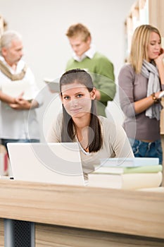 High school library - Student with laptop