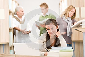 High school library - Student with laptop