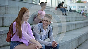 High school pupil getting acquainted pretty red-haired female romantic feelings