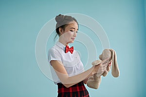 high school student is sitting on the windowsill. Anime style