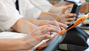 Students using digital technology in the classroom.