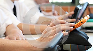 Students using digital technology in the classroom.