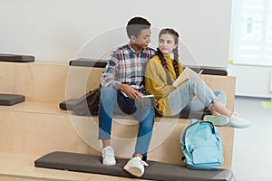 high school students couple studying together