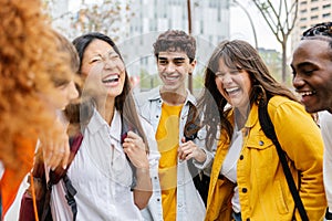 High school students group having fun outdoor after class.