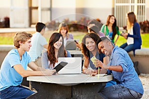 High School Students Hanging Out On Campus