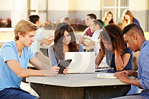 High School Students Hanging Out On Campus