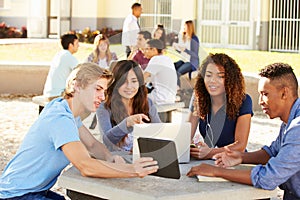 High School Students Hanging Out On Campus