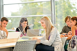 High- school students studying in library together