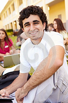 High School Students Studying Outdoors On Campus