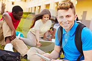 High School Students Studying Outdoors On Campus