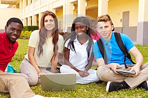 High School Students Studying Outdoors On Campus