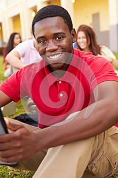 High School Students Studying Outdoors On Campus