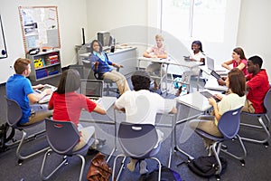 High School Students Taking Part In Group Discussi