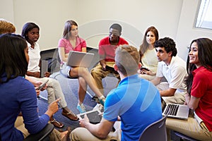 High School Students Taking Part In Group Discussi