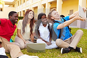 High School Students Taking Selfie With Digital Tablet