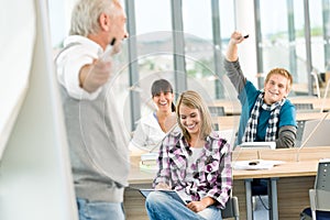 High school - three students with mature professor