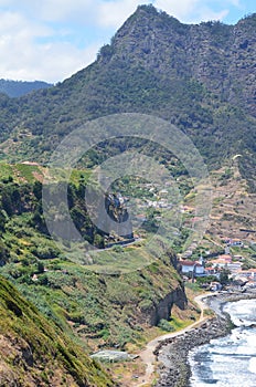 High seacliffs and black sand beaches in Porto da Cruz, Madeiraâ€™s northern coast