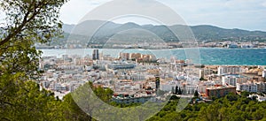 High side view from hills in St Antoni de Portmany, Ibiza, clearing November day. Warm autumn breeze, Balearic Islands, Spain.