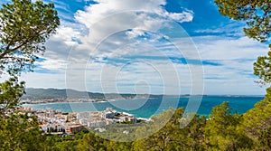 High side view from hills in St Antoni de Portmany, Ibiza, clearing November day. Warm autumn breeze, Balearic Islands, Spain.