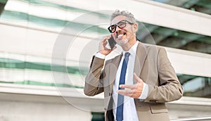 High-skilled senior businessman in formal suit