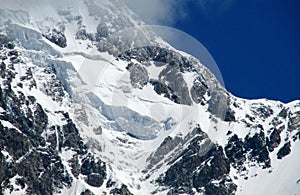 High snow and rocky mountain range